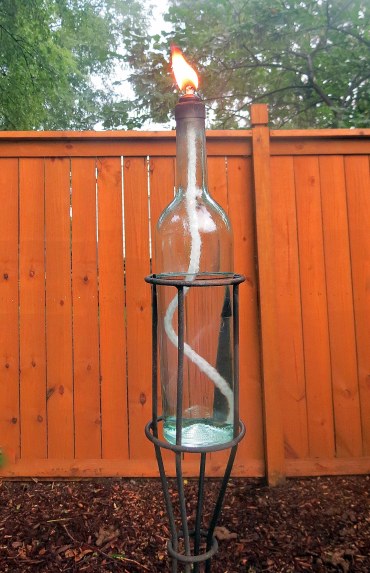 DIY - Bottle Tiki Torches - Wine bottle in stand